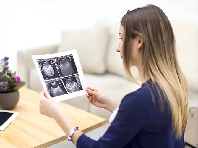 Fetal medicine specialists consulting with patient