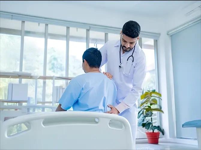 Orthopedic doctor treating patient